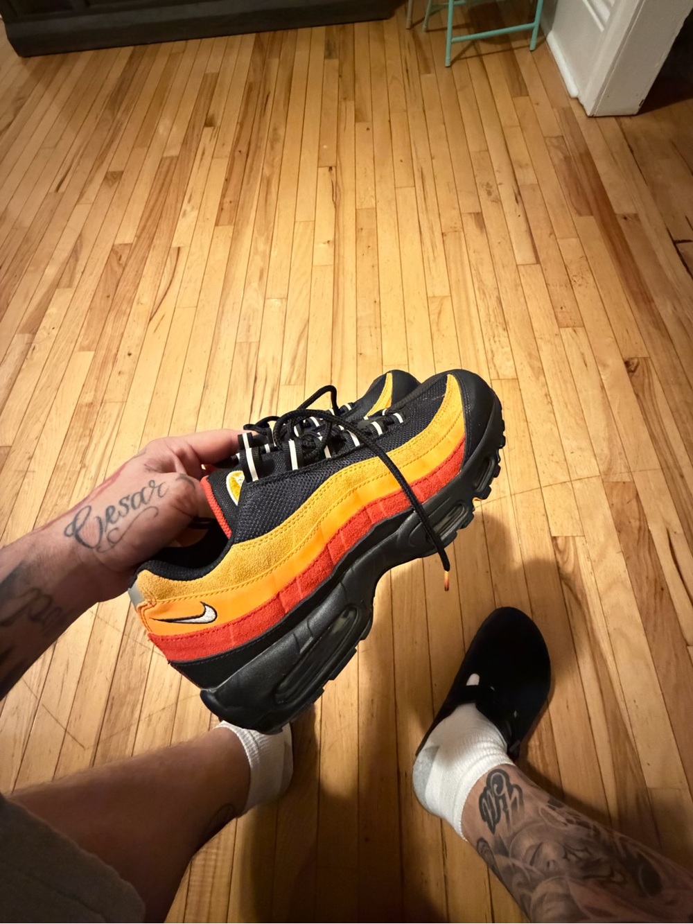 Nike Men's Black Sneakers with Orange and Red Gradient Panels